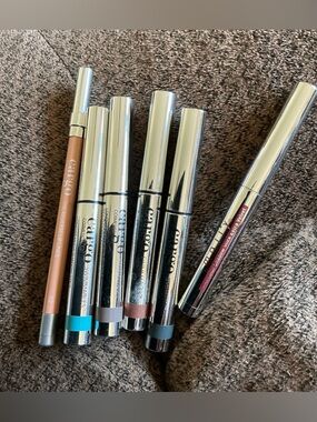 6 Makeup bundle Discontinued 4 Cargo swimmables Eye shadow sticks + lip + Mally